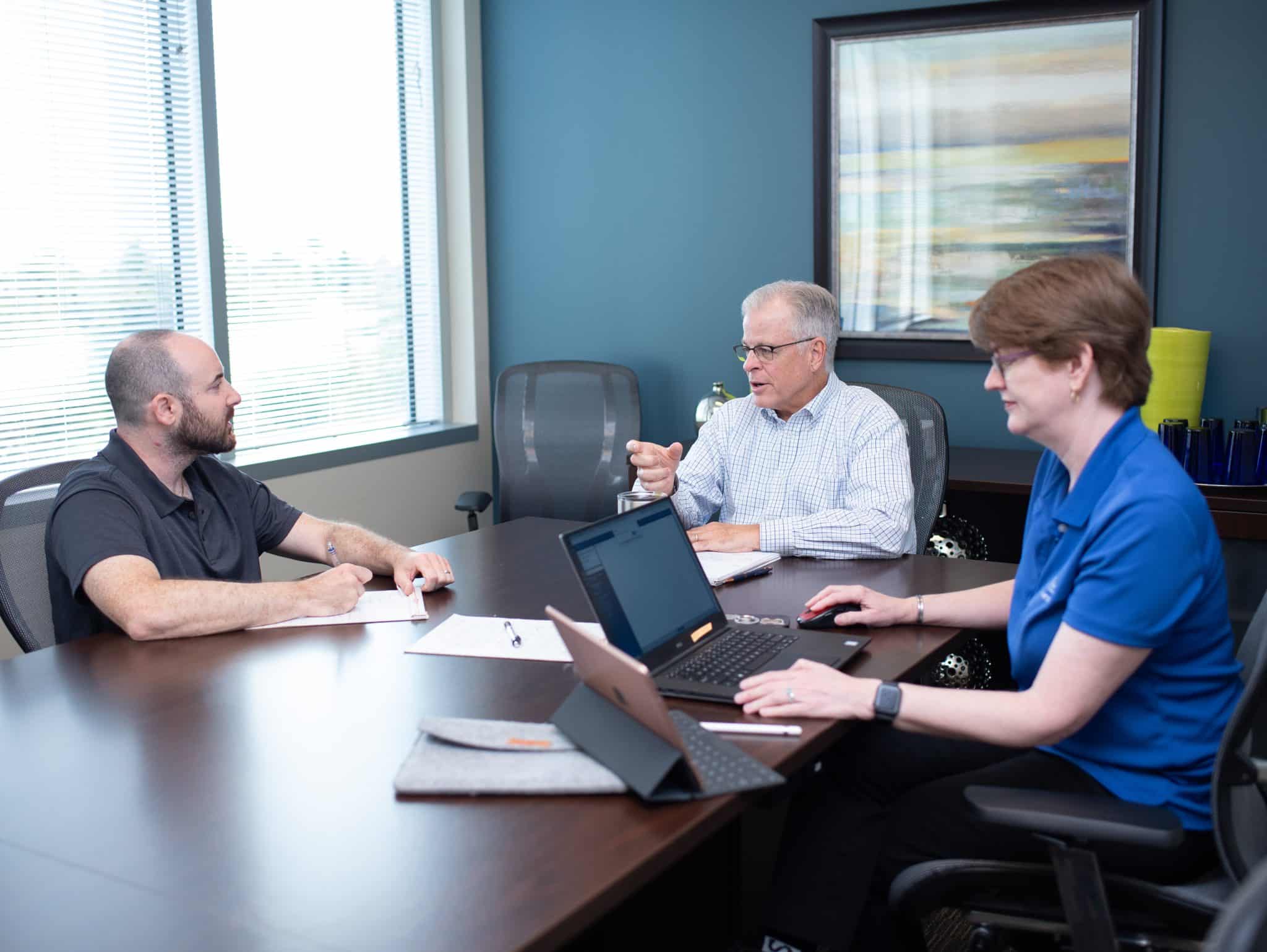 Blaine and Melody consulting a client.